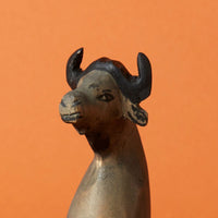 Painted Wood Wild Buffalo Sitting Sculpture