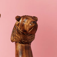 Seared Wood Lion Sitting Sculpture