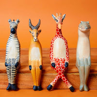 Painted Wood Sitting Giraffe Sculpture