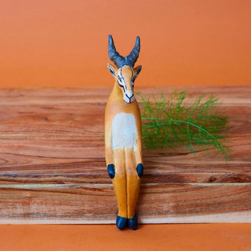 Painted Wood Sitting Antelope Sculpture
