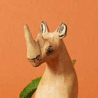 Painted Wood Rhino Sitting Sculpture