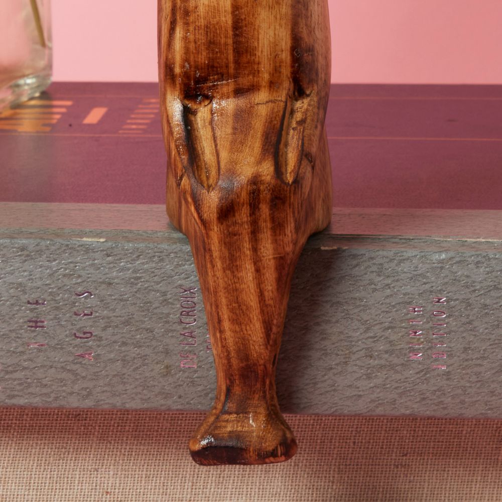 Seared Wood Rhino Sitting Sculpture