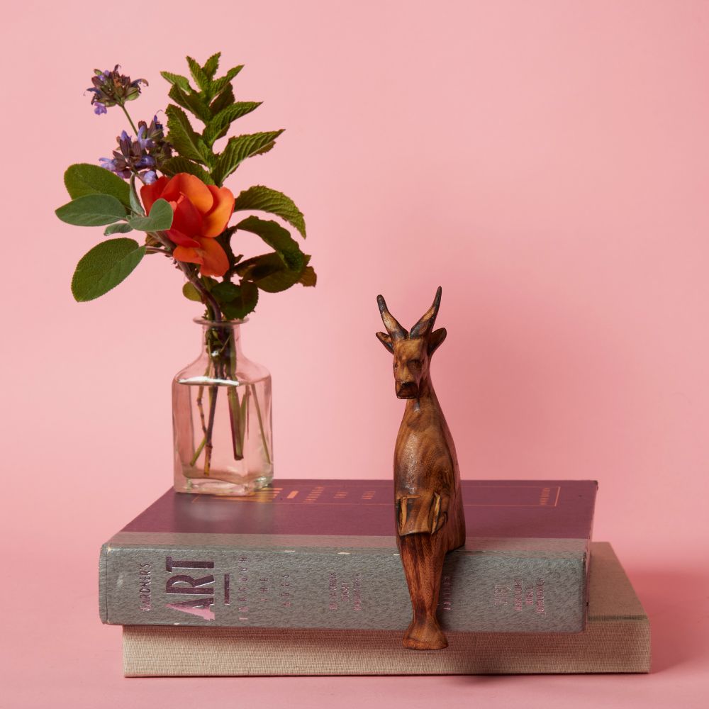 Seared Wood Antelope Sitting Sculpture