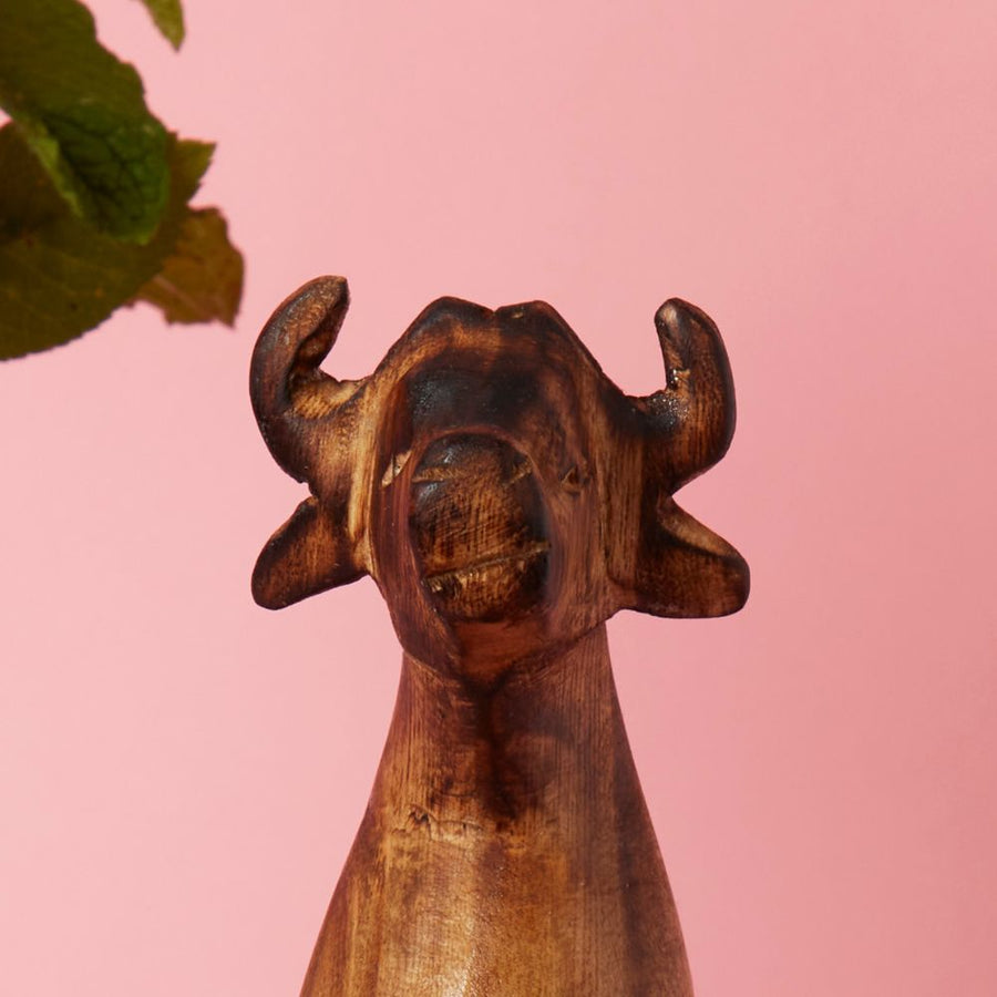 Seared Wood Buffalo Sitting Sculpture